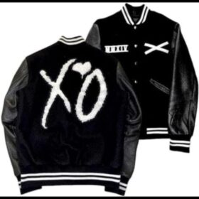 XO Varsity Jacket black wool blend body with leather sleeves XO logo patch on the back and embroidered front details classic varsity style